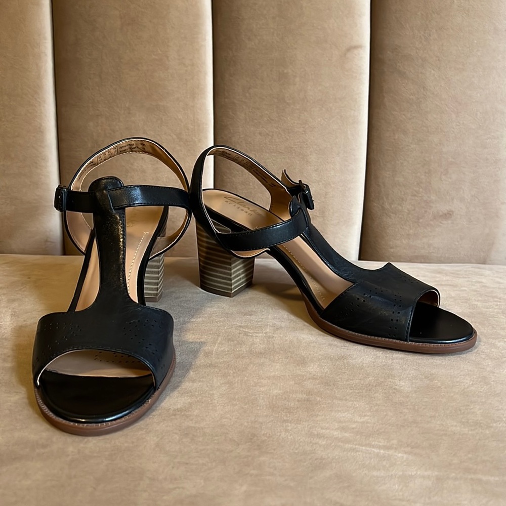 Clarks black leather t-strap 3 inch heels with cutout details